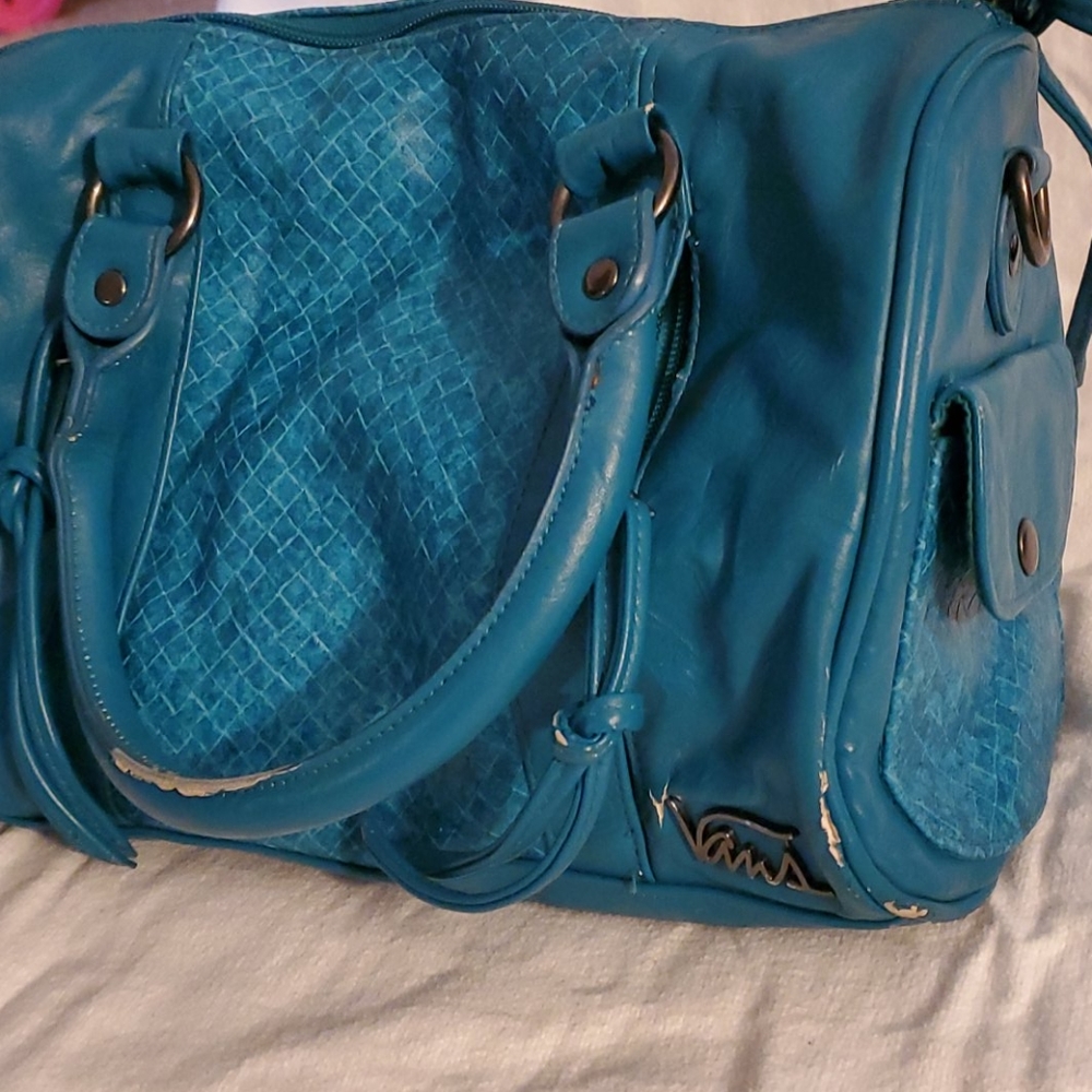 Teal Van's purse